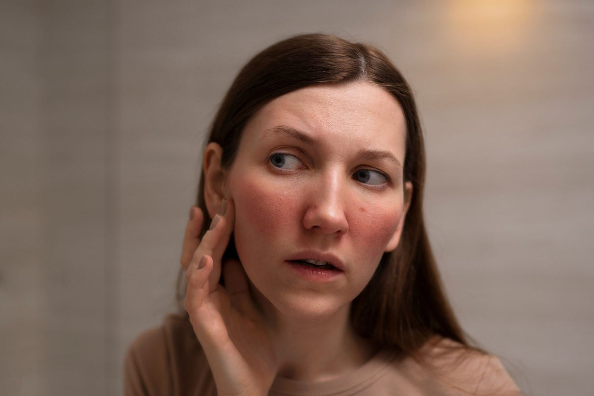 Woman checking out her skin