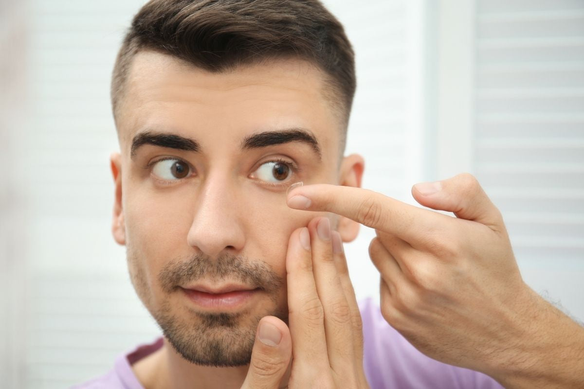 applying best eye cream by OM Botanical