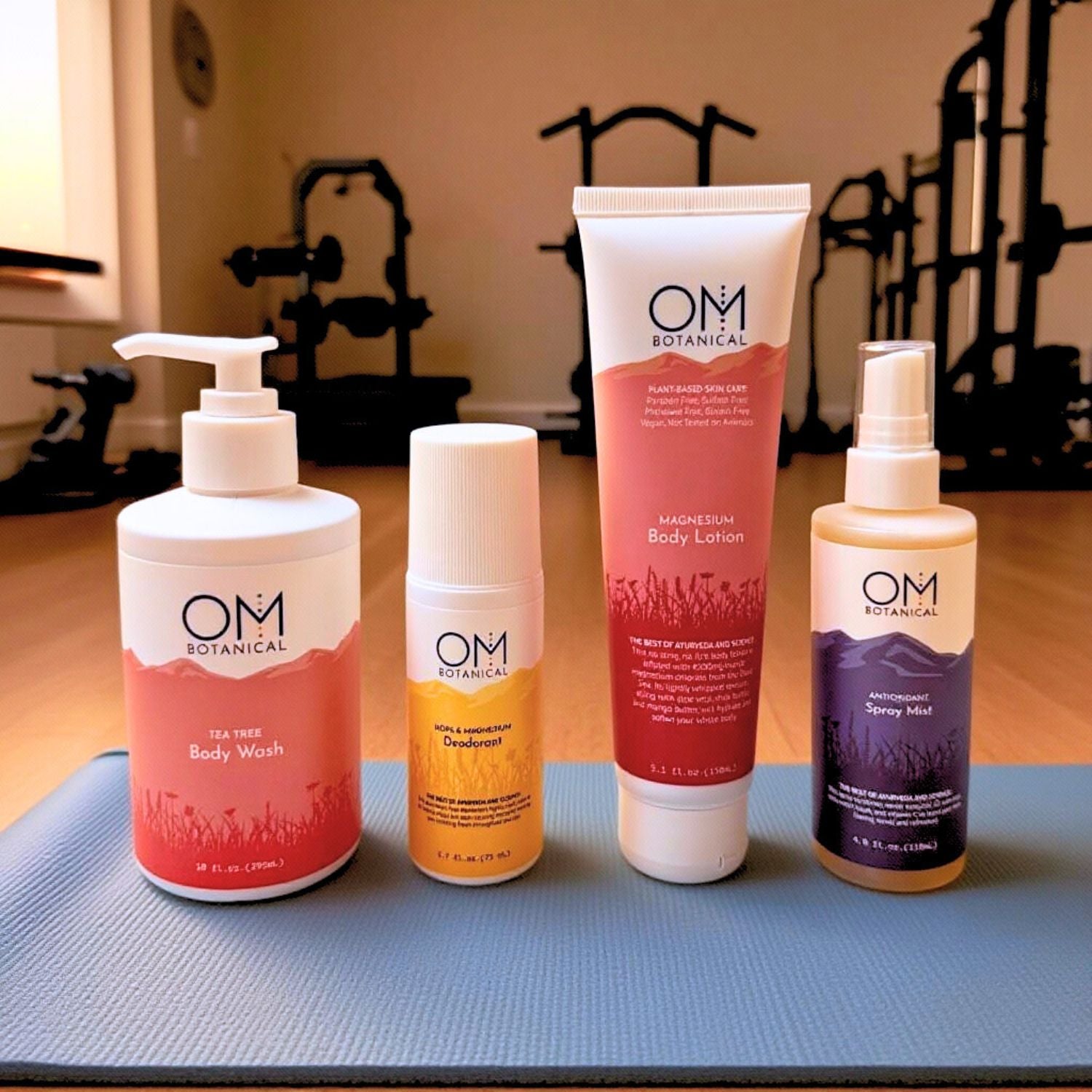 Active Refresh Set with tea tree body wash, clean deodorant, magnesium body lotion, and antioxidant spray mist on a yoga mat. Ideal for active lifestyles.