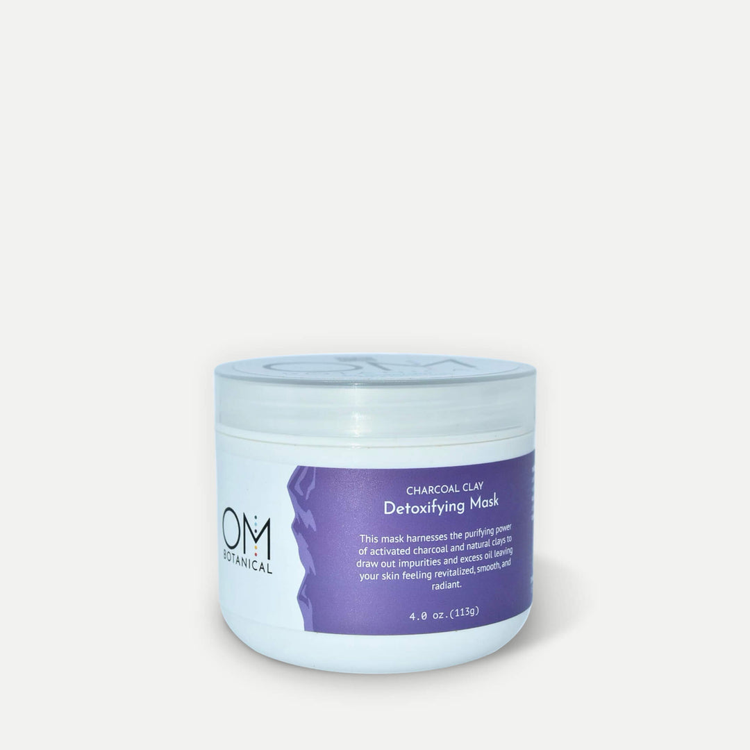 Charcoal & Clay Detox Face Mask in a 4 oz jar with purple label, ideal for purifying and revitalizing skin using natural botanicals.