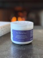 Mandelic Acid Mask - lifestyle on table by fireplace | OM Botanical