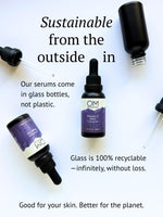OM Botanical serums in glass bottles with droppers on a white background, emphasizing sustainable packaging