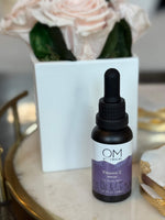 Vitamin C Serum - lifestyle on tray during evening beauty ritual | OM Botanical